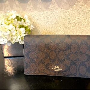 Coach signature print fold over crossbody clutch NWT